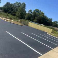 Transforming-Asphalt-Surfaces-Our-Seamless-Seal-Coating-Striping-and-Asphalt-Repair-Project-in-Milton-FL 0